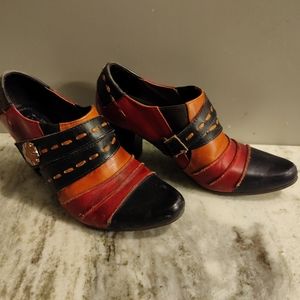 Leathered heeled shoes, red orange and black